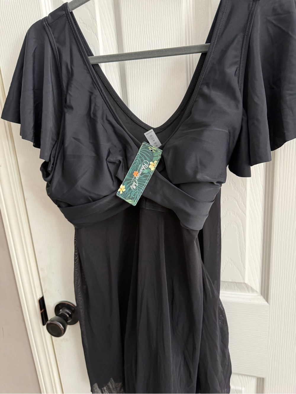 Women's Black Flutter Sleeve one piece swimsuit with built in cover up on bottom